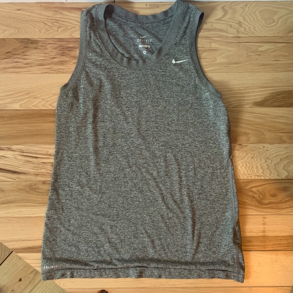 Gray Nike Dri-Fit tank.